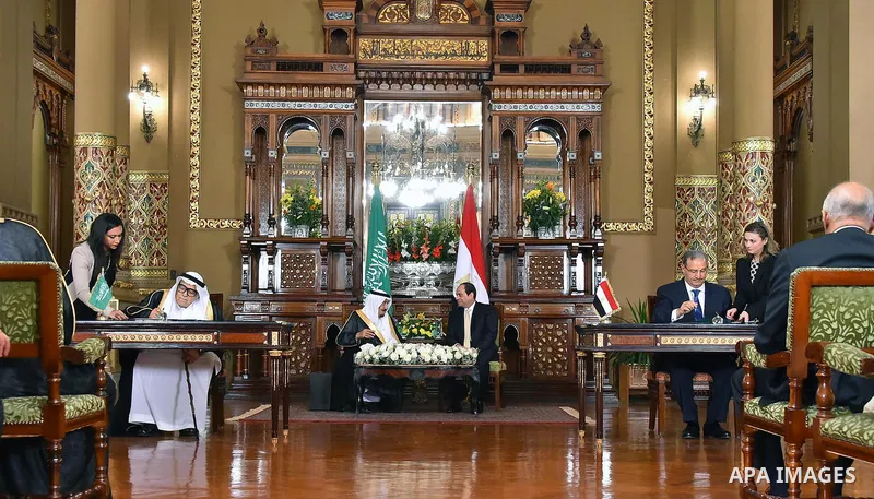 A handout picture released by the Egyptian Presidency on April 10, 2016 shows Egyptian President Abdel Fattah al-Sisi meeting with Saudi King Salman bin Abdulaziz as part of a signing ceremony for bilateral aggrements at...