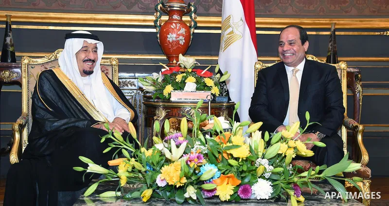 A handout picture released by the Egyptian Presidency on April 10, 2016 shows Egyptian President Abdel Fattah al-Sisi meeting with Saudi King Salman bin Abdulaziz as part of a signing ceremony for bilateral aggrements at...