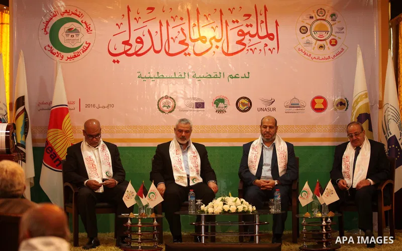 Senior Hamas leaders attend a meeting of the International Forum of Parliament, in Gaza city, on April 10, 2016. Photo by Ashraf Amra