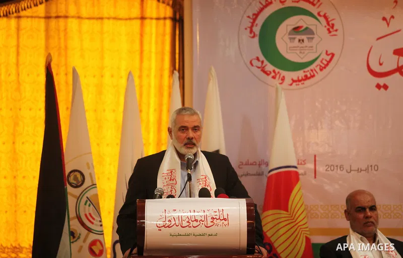 Senior Hamas leader Ismail Haniya speaks during a meeting of the International Forum of Parliament, in Gaza city, on April 10, 2016. Photo by Ashraf Amra