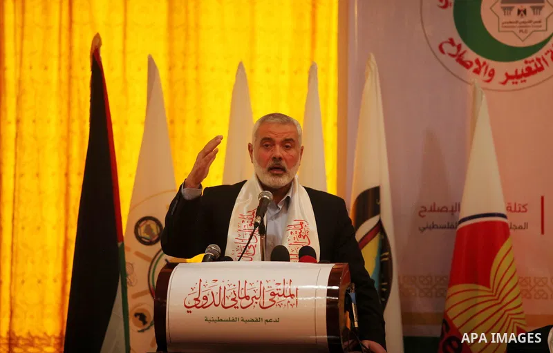 Senior Hamas leader Ismail Haniya speaks during a meeting of the International Forum of Parliament, in Gaza city, on April 10, 2016. Photo by Ashraf Amra