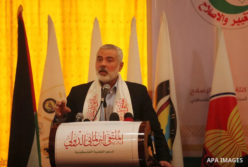 Senior Hamas leader Ismail Haniya speaks during a meeting of the International Forum of Parliament, in Gaza city, on April 10, 2016. Photo by Ashraf Amra