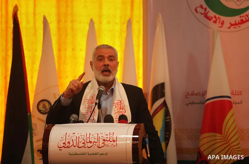 Senior Hamas leader Ismail Haniya speaks during a meeting of the International Forum of Parliament, in Gaza city, on April 10, 2016. Photo by Ashraf Amra