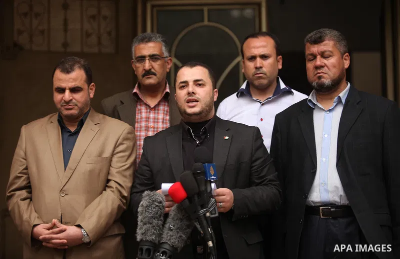 Spokesman of the National Commission to break the siege Adham Abu Salmiya, speaks during a press conference, in Gaza city, on April 10, 2016. Photo by Ashraf Amra