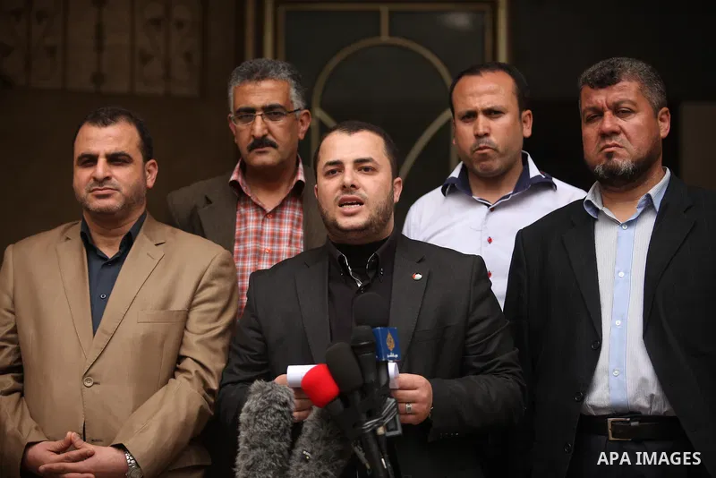 Spokesman of the National Commission to break the siege Adham Abu Salmiya, speaks during a press conference, in Gaza city, on April 10, 2016. Photo by Ashraf Amra