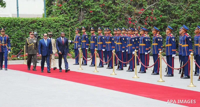 Egyptian President Abdel Fattah al-Sisi and President of Togo, Faure Gnassingbe reviewing troops before a meeting in the capital Cairo on April 10, 2016. Photo by Egyptian President Office