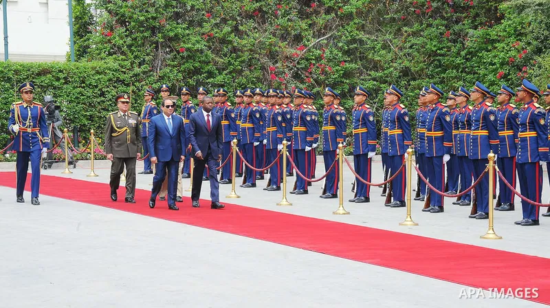 Egyptian President Abdel Fattah al-Sisi and President of Togo, Faure Gnassingbe reviewing troops before a meeting in the capital Cairo on April 10, 2016. Photo by Egyptian President Office