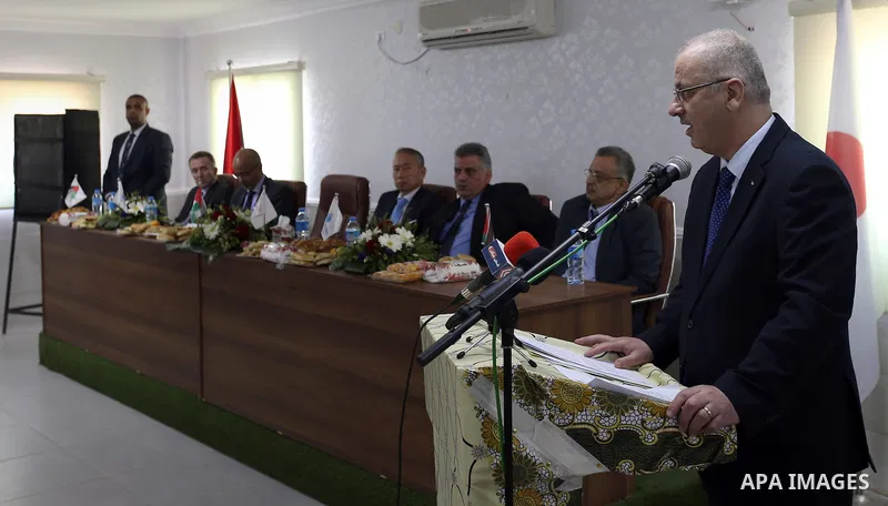 Palestinian Prime Minister, Rami hamdallah, takes part the closing ceremony, "a project to promote peace-building through Japanese sewage management in the West Bank city of Ramallah on April 11, 2016. Photo by Prime Min...
