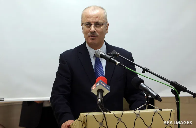 Palestinian Prime Minister, Rami hamdallah, takes part the closing ceremony, "a project to promote peace-building through Japanese sewage management in the West Bank city of Ramallah on April 11, 2016. Photo by Prime Min...