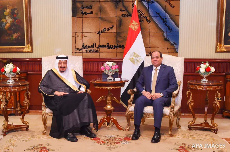 Saudi King Salman sits next to Egyptian President Abdel Fattah al-Sisi before leaving Cairo's international airport on April 11, 2016. Photo by Egyptian President Office