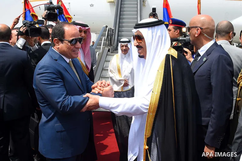 Saudi King Salman shake hands with Egyptian President Abdel Fattah al-Sisi before leaving Cairo's international airport on April 11, 2016. Photo by Egyptian President Office