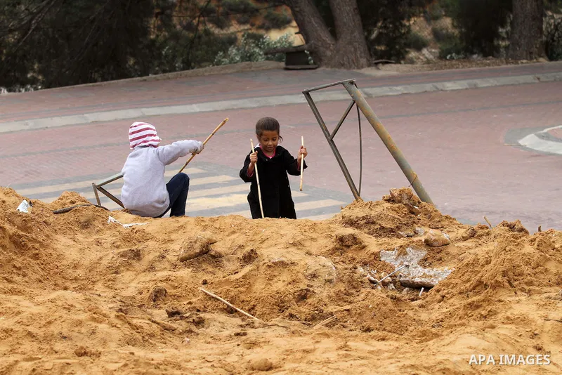 Palestinian children inspect the damage to a children's garden after it was demolished by Israeli troops in the village of Za'tara near the West Bank city of Nablus, Tuesday, April 12, 2016. Israeli forces demolished the...