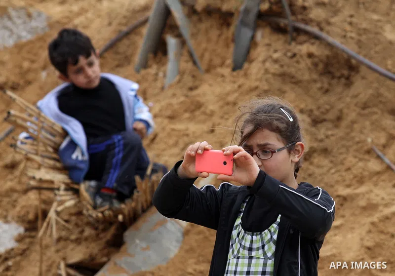 Palestinian children inspect the damage to a children's garden after it was demolished by Israeli troops in the village of Za'tara near the West Bank city of Nablus, Tuesday, April 12, 2016. Israeli forces demolished the...