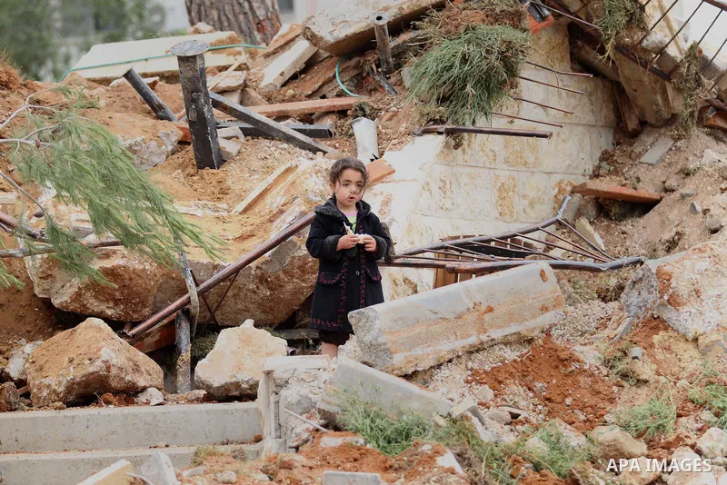 Palestinian children inspect the damage to a children's garden after it was demolished by Israeli troops in the village of Za'tara near the West Bank city of Nablus, Tuesday, April 12, 2016. Israeli forces demolished the...