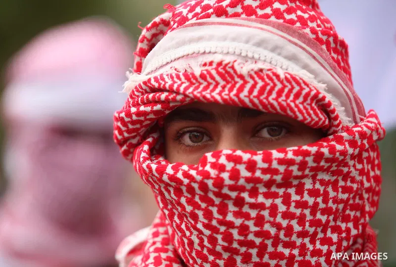 Supporters of the Popular Front for the Liberation of Palestine (PFLP) take part in a protest against the policies of Palestinian President Mahmoud Abbas, in Gaza City April 12, 2016. Photo by Ashraf Amra