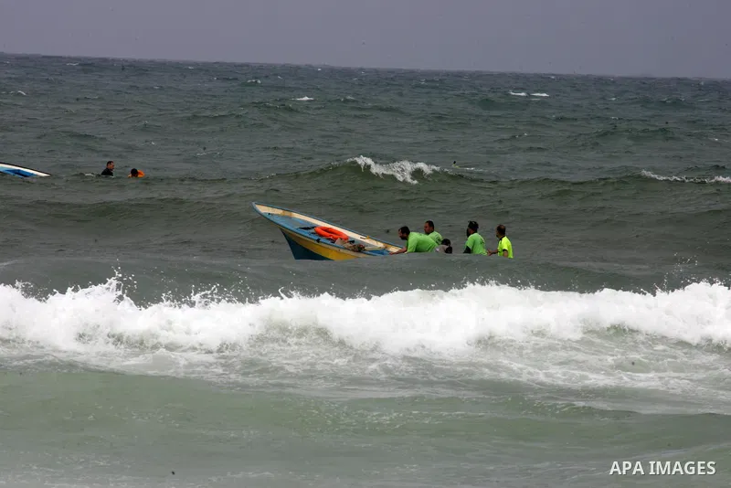 Hamas marine security show their skills during a naval exercise at the coast of the Mediterranean in Rafah in the sourthern Gaza strip on April 12, 2016. Photo by Abed Rahim Khatib