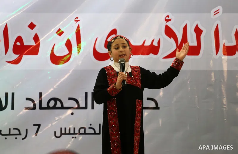 Palestinians take part during a rally marking Palestinian Prisoners' Day in Gaza City April 14, 2016. Photo by Mohammed Asad