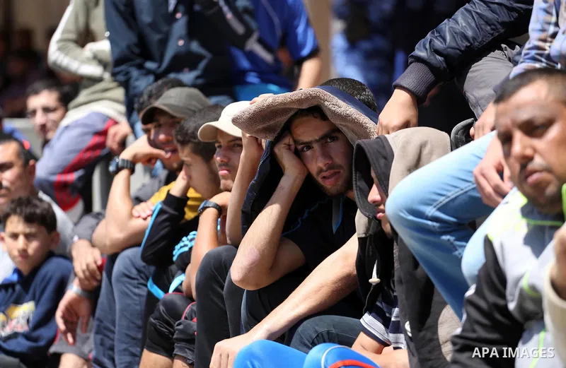 Palestinians attend Friday prayers in front of Red cross office in Gaza city on April 15, 2016. Photo by Mohammed Asad