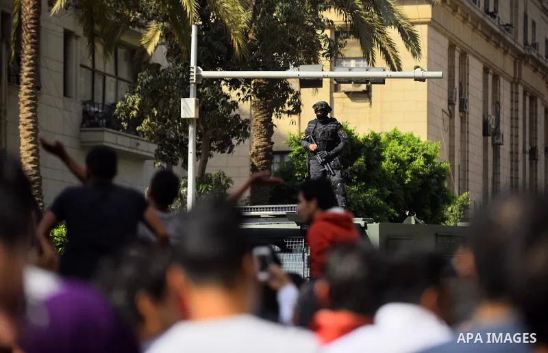Egyptian activists shout slogans against President Abdel Fattah al-Sisi and his government, during a demonstration protesting the government's decision to transfer two Red Sea islands to Saudi Arabia, in front of the Pre...