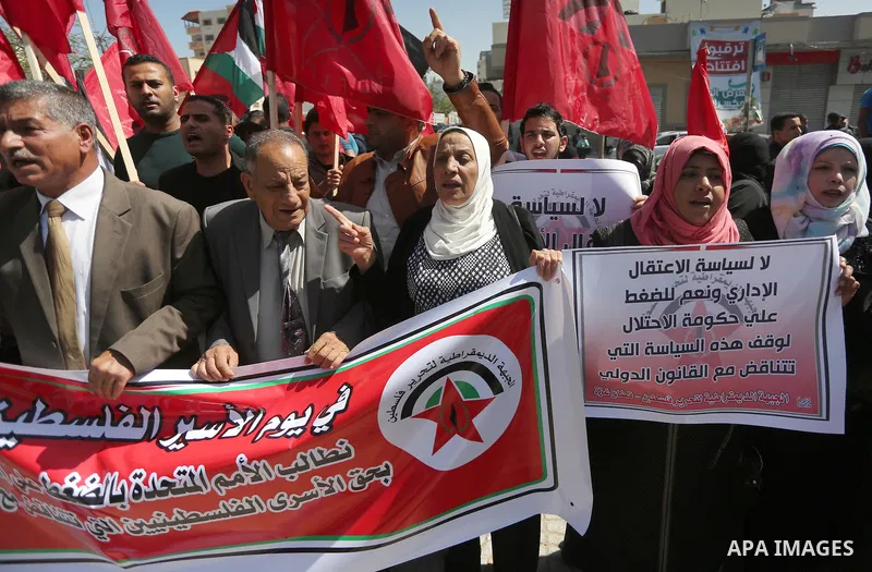 Palestinians take part during a rally marking Palestinian Prisoner Day in Gaza City on April 17, 2016. Photo by Mohammed Asad
