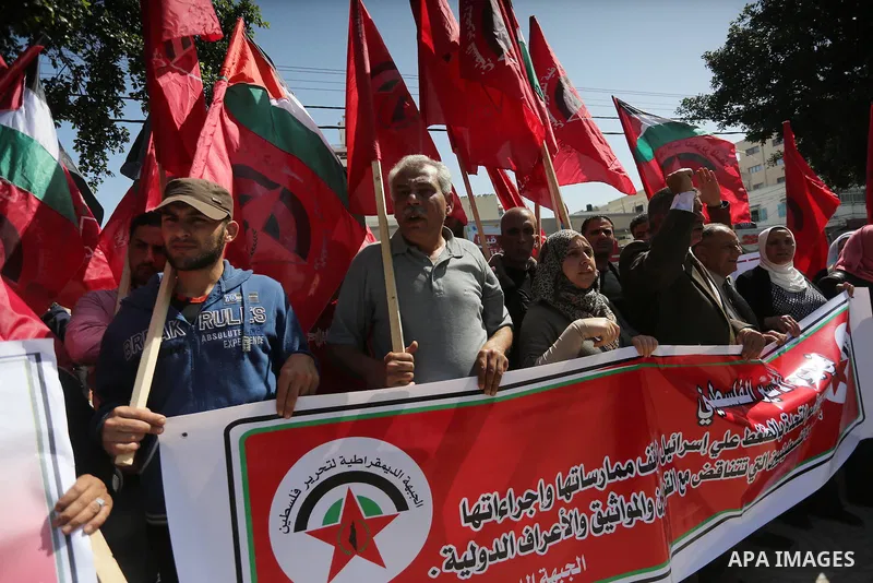 Palestinians take part during a rally marking Palestinian Prisoner Day in Gaza City on April 17, 2016. Photo by Mohammed Asad