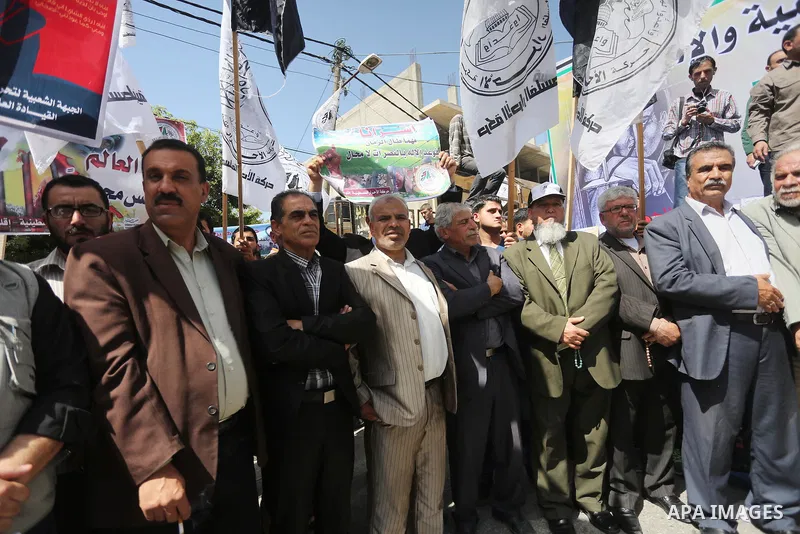 Palestinians take part during a rally marking Palestinian Prisoner Day in Gaza City on April 17, 2016. Photo by Mohammed Asad