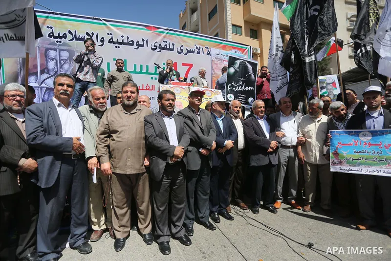 Palestinians take part during a rally marking Palestinian Prisoner Day in Gaza City on April 17, 2016. Photo by Mohammed Asad