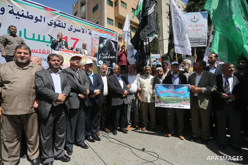 Palestinians take part during a rally marking Palestinian Prisoner Day in Gaza City on April 17, 2016. Photo by Mohammed Asad