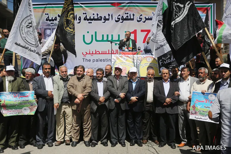 Palestinians take part during a rally marking Palestinian Prisoner Day in Gaza City on April 17, 2016. Photo by Mohammed Asad