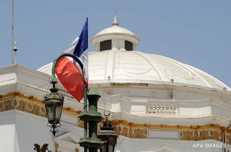 A picture shows Egyptian and French flags welcoming French President Francois Hollande to the country, Cairo, Egypt, April 17, 2016. Photo by Amr Sayed