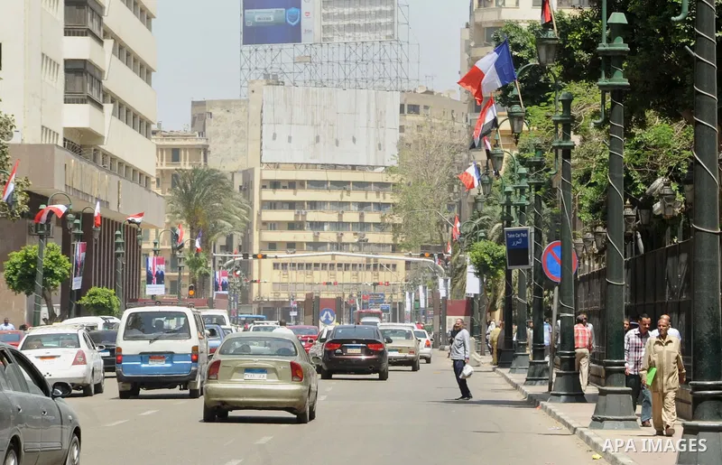 A picture shows Egyptian and French flags welcoming French President Francois Hollande to the country, Cairo, Egypt, April 17, 2016. Photo by Amr Sayed