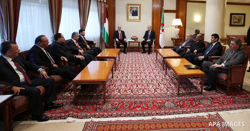 Palestinian Prime Minister Rami Hamdallah meets with Algerian Prime Minister Abdelmalek Sellal during his visit to Algeria, on April 18, 2016. Photo by Prime Minister Office