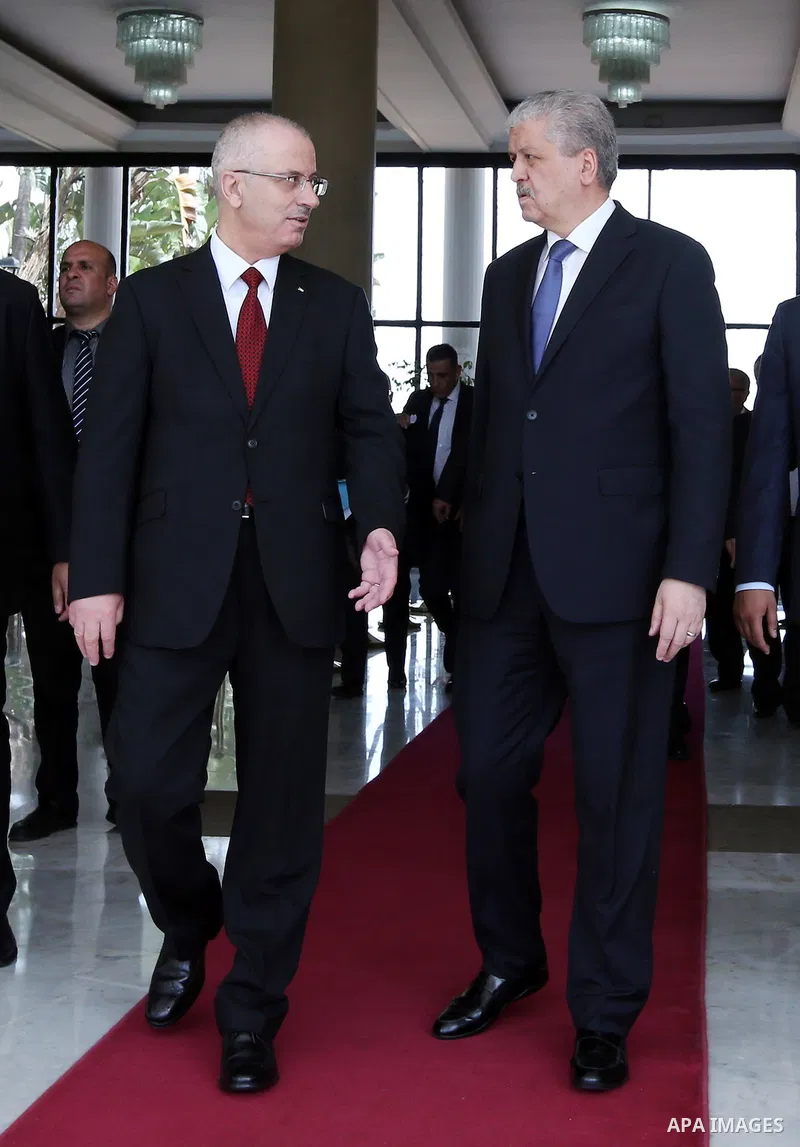 Palestinian Prime Minister Rami Hamdallah meets with Algerian Prime Minister Abdelmalek Sellal during his visit to Algeria, on April 18, 2016. Photo by Prime Minister Office