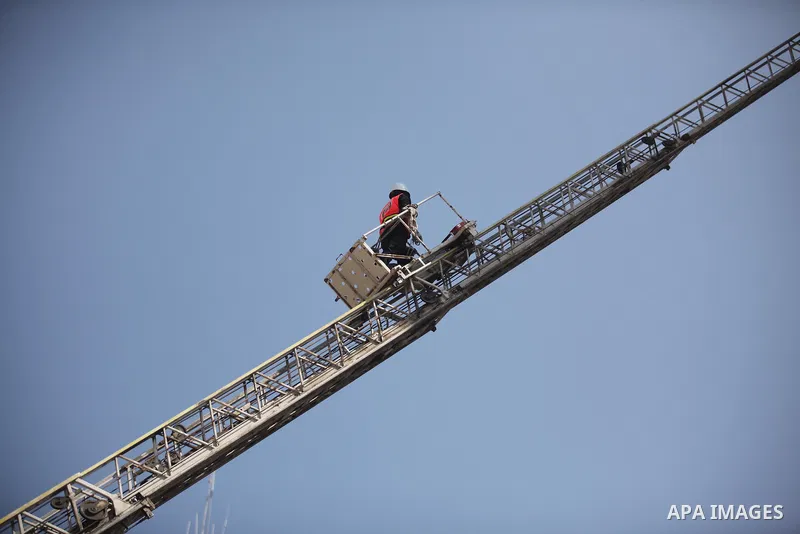 Palestinian emergency personnel take part in a drill in a building which was destroyed during the 50-day war between Israel and Hamas militants in the summer of 2014, in Gaza City, on April 19, 2016. Photo by Ashraf Amra
