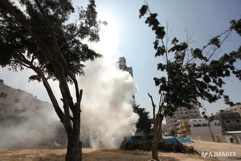 Palestinian emergency personnel take part in a drill in a building which was destroyed during the 50-day war between Israel and Hamas militants in the summer of 2014, in Gaza City, on April 19, 2016. Photo by Ashraf Amra