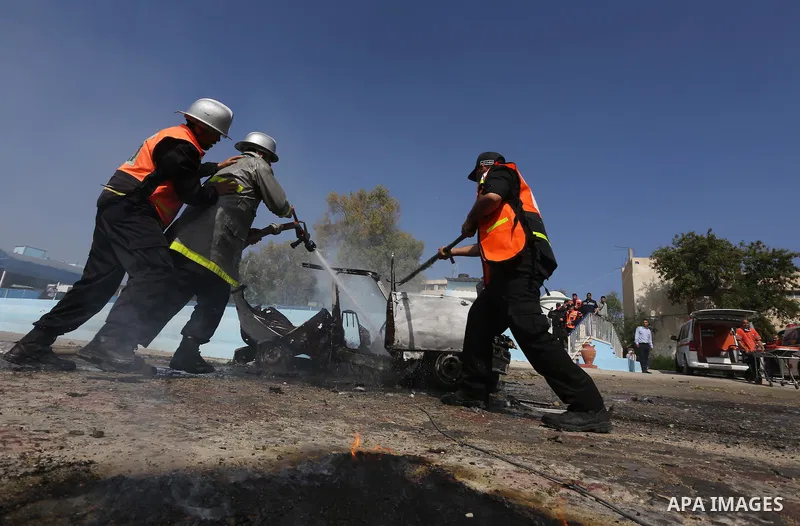 Palestinian emergency personnel take part in a drill , in Gaza City, on April 19, 2016. Photo by Mohammed Asad