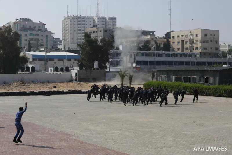 Palestinian emergency personnel take part in a drill , in Gaza City, on April 19, 2016. Photo by Mohammed Asad