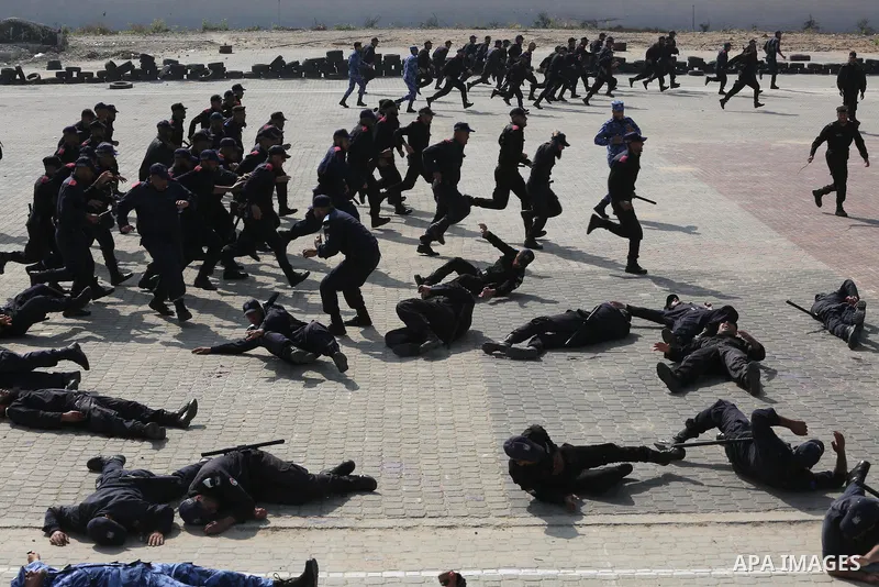 Palestinian emergency personnel take part in a drill , in Gaza City, on April 19, 2016. Photo by Mohammed Asad