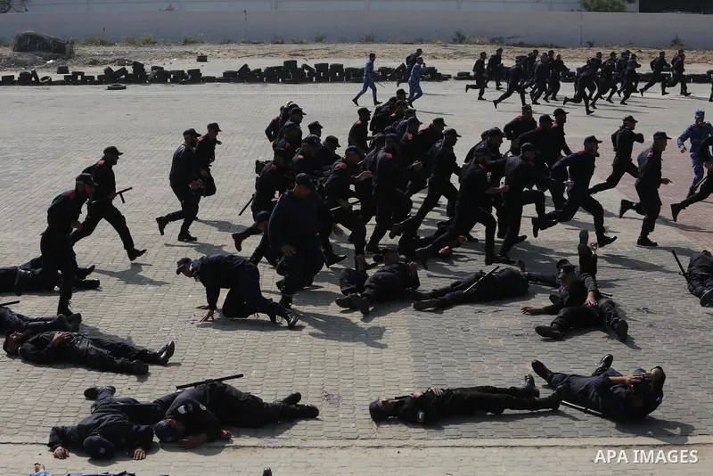 Palestinian emergency personnel take part in a drill , in Gaza City, on April 19, 2016. Photo by Mohammed Asad
