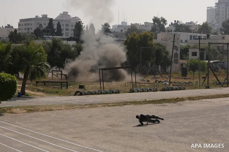 Palestinian emergency personnel take part in a drill , in Gaza City, on April 19, 2016. Photo by Mohammed Asad