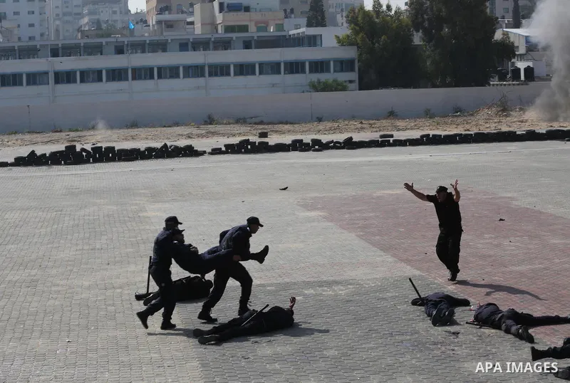 Palestinian emergency personnel take part in a drill , in Gaza City, on April 19, 2016. Photo by Mohammed Asad