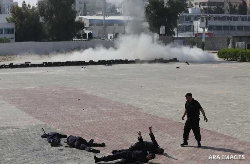 Palestinian emergency personnel take part in a drill , in Gaza City, on April 19, 2016. Photo by Mohammed Asad