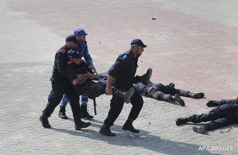 Palestinian emergency personnel take part in a drill , in Gaza City, on April 19, 2016. Photo by Mohammed Asad