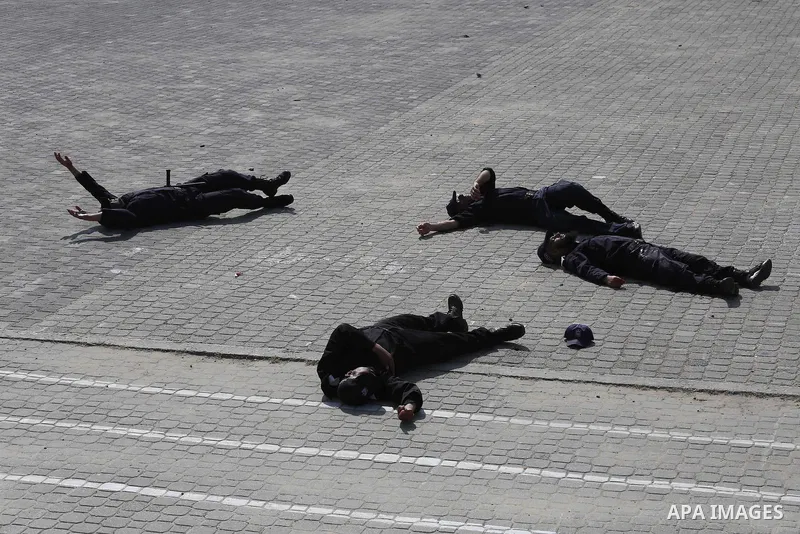Palestinian emergency personnel take part in a drill , in Gaza City, on April 19, 2016. Photo by Mohammed Asad