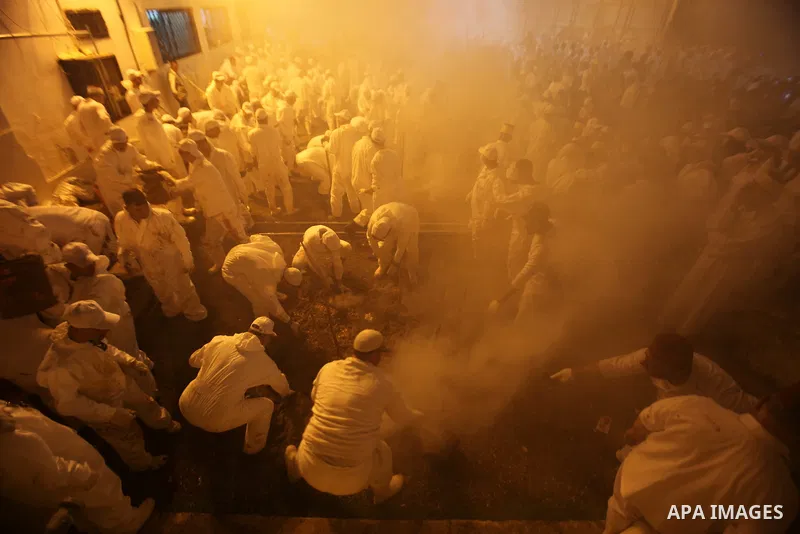 Members of the ancient Samaritan community participate in the ritual of Passover Sacrifice on Mount Grizim, overlooking the West Bank town of Nablus, April 20, 2016. Samaritans descended from the ancient Israelite tribes...