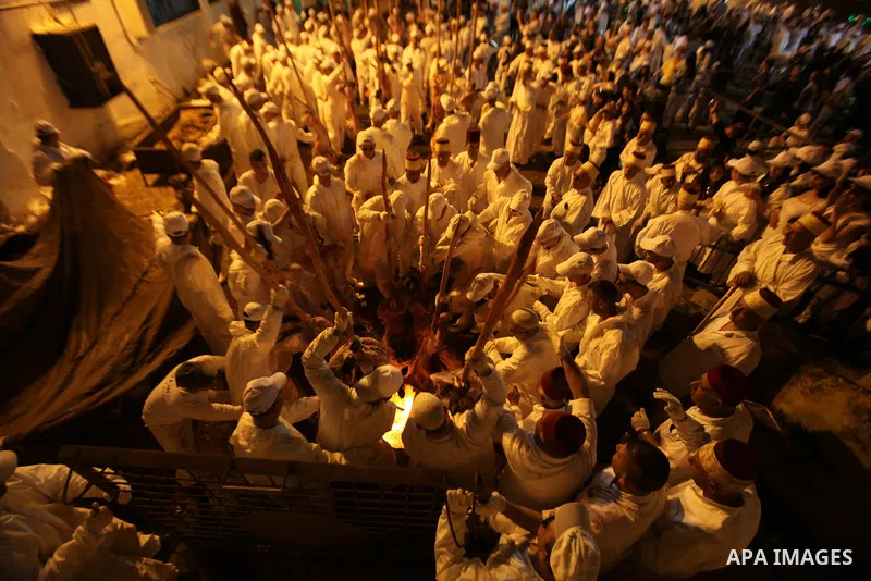 Members of the ancient Samaritan community participate in the ritual of Passover Sacrifice on Mount Grizim, overlooking the West Bank town of Nablus, April 20, 2016. Samaritans descended from the ancient Israelite tribes...