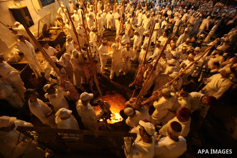Members of the ancient Samaritan community participate in the ritual of Passover Sacrifice on Mount Grizim, overlooking the West Bank town of Nablus, April 20, 2016. Samaritans descended from the ancient Israelite tribes...