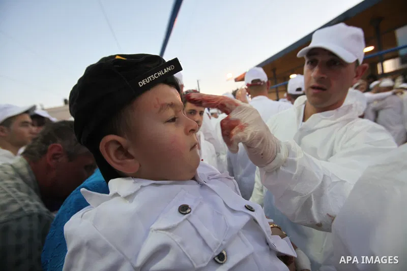 Members of the ancient Samaritan community participate in the ritual of Passover Sacrifice on Mount Grizim, overlooking the West Bank town of Nablus, April 20, 2016. Samaritans descended from the ancient Israelite tribes...
