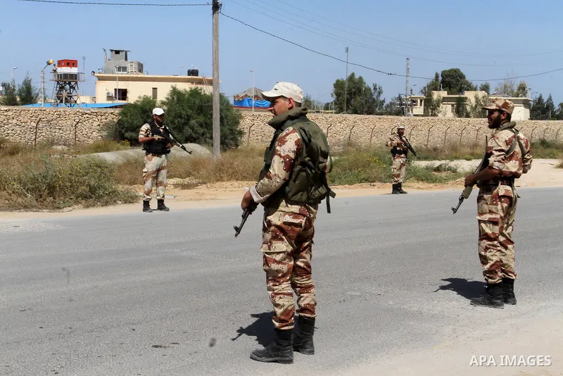 Members of Palestinian security forces loyal to Hamas stand guard as they are deployed to maintain security on the border of southern Gaza Strip with Egypt, April 21, 2016. Hamas began deploying additional forces on the...