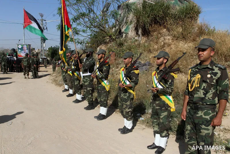 Members of Palestinian security forces loyal to Hamas salute as they are deployed to maintain security on the border of southern Gaza Strip with Egypt, April 21, 2016. Hamas began deploying additional forces on the Gaza...